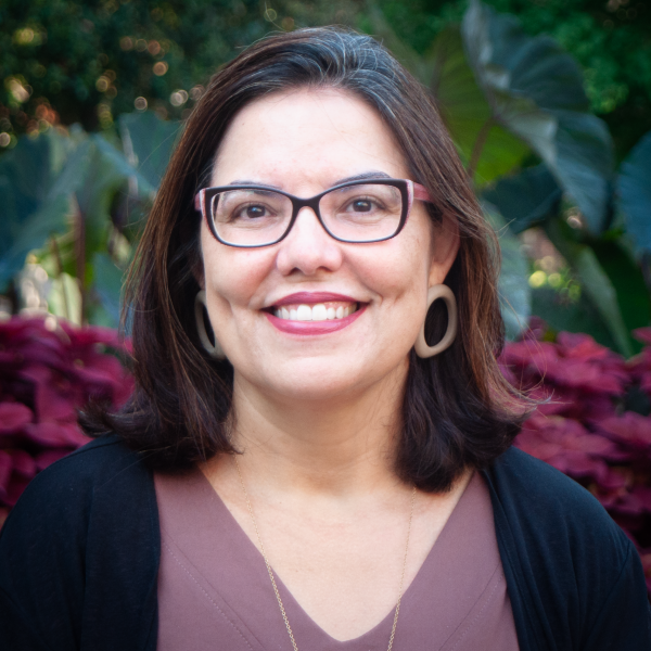 Photo of Dr. Cris Lira smiling 