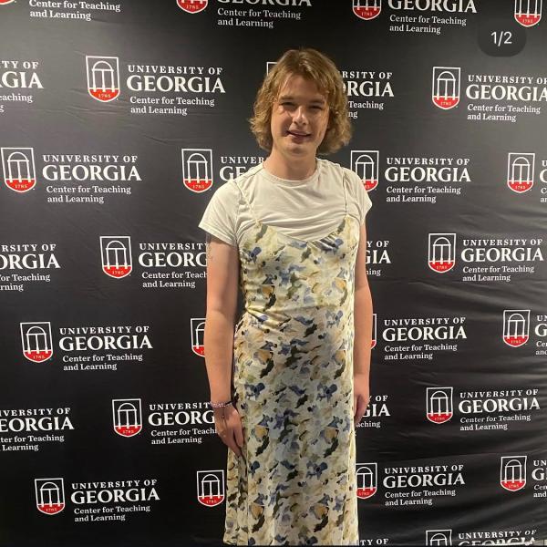 Flor in a floral dress.