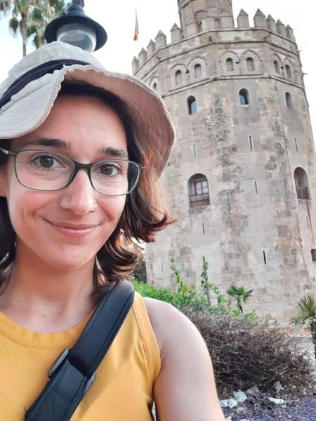 Allonah in front of the Torre de Oro in Sevilla Spain